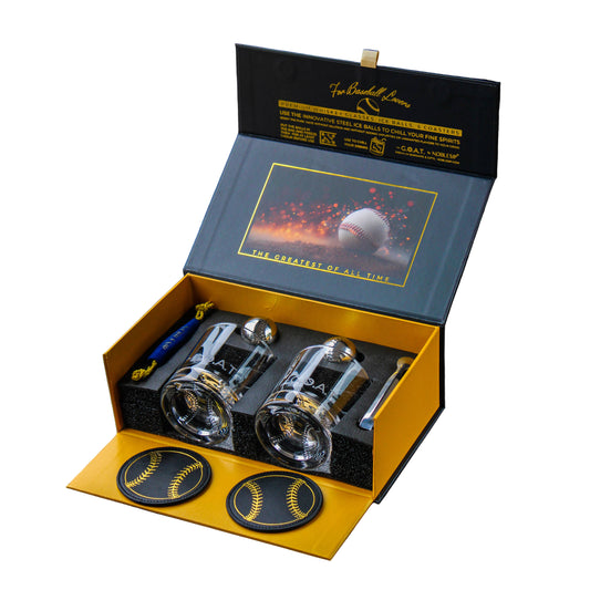Luxury glassware set with coasters in a branded box on a dark background